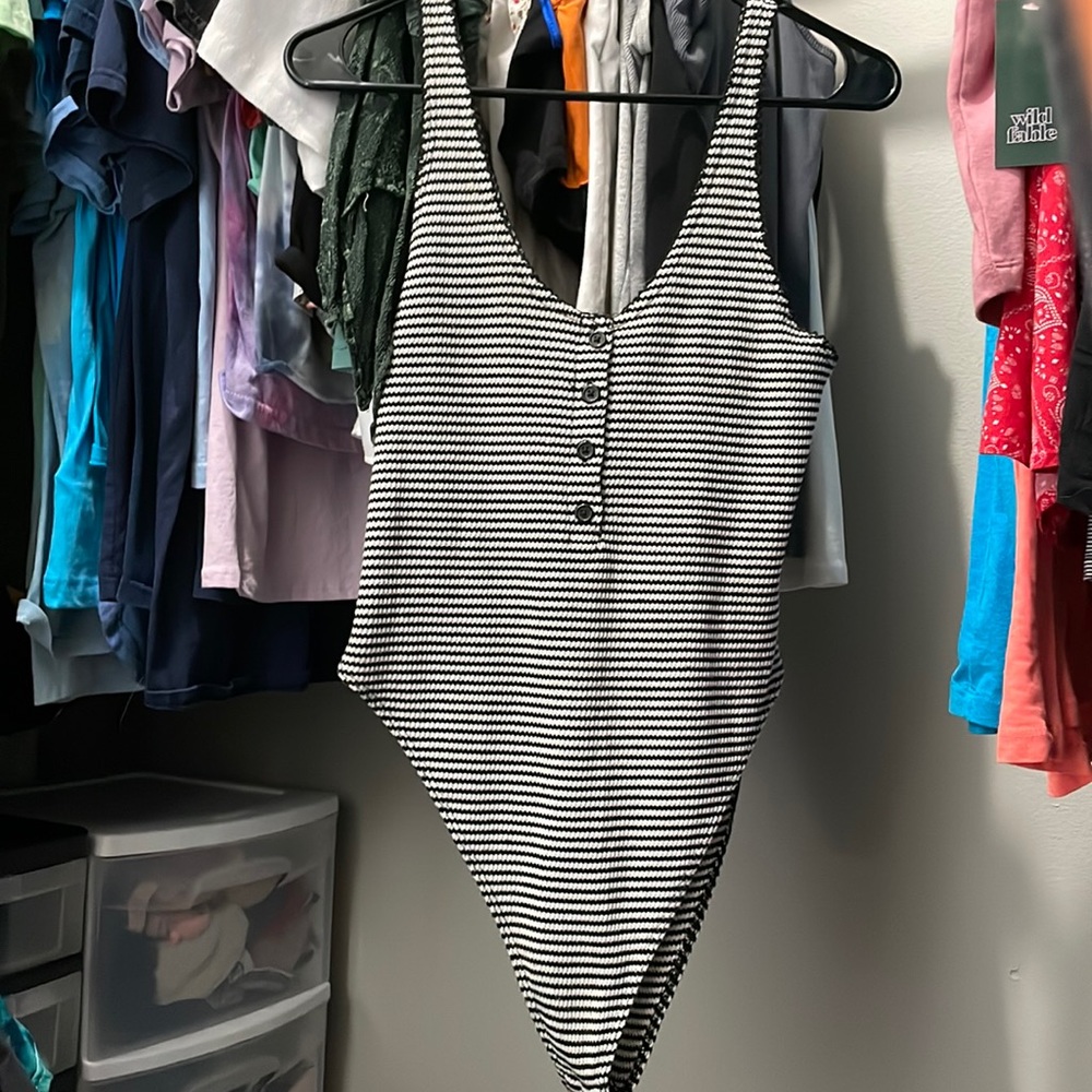 Black and white stripe body suit